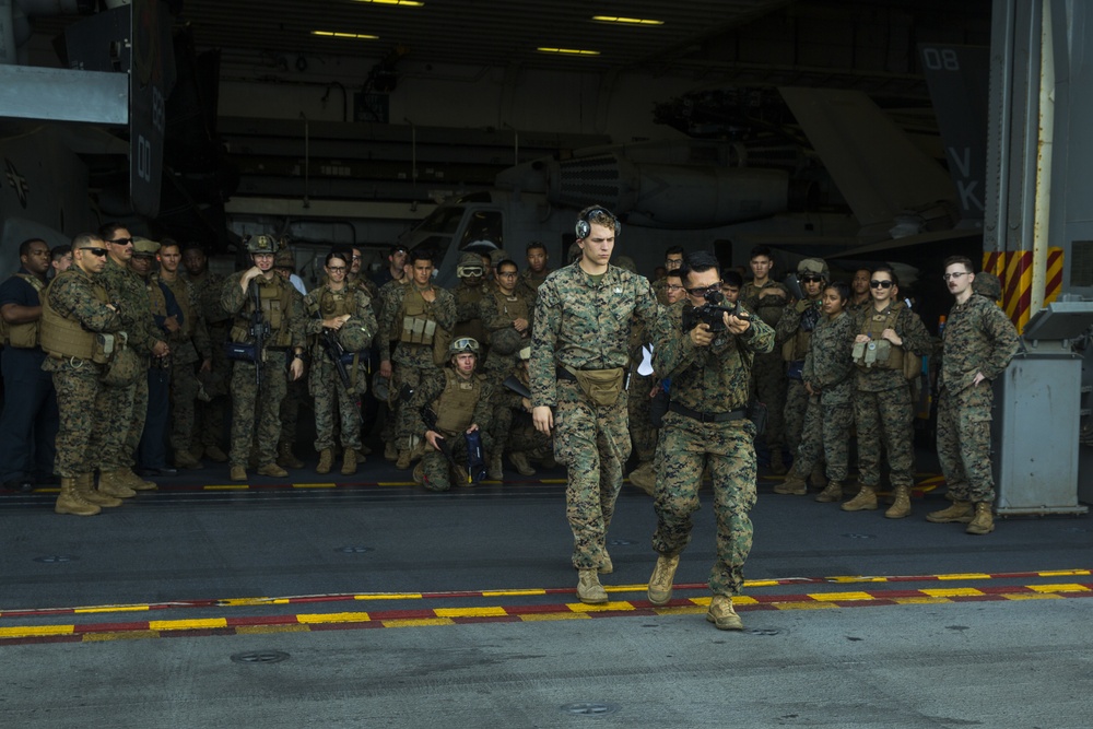 31st MEU Marines and sailors aboard USS America conduct live fire deck shoot