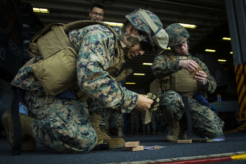 31st MEU Marines and sailors aboard USS America conduct live fire deck shoot