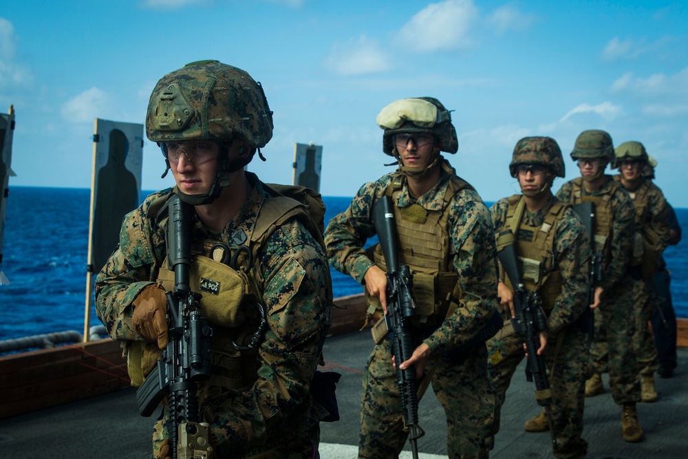 31st MEU Marines and sailors aboard USS America conduct live fire deck shoot