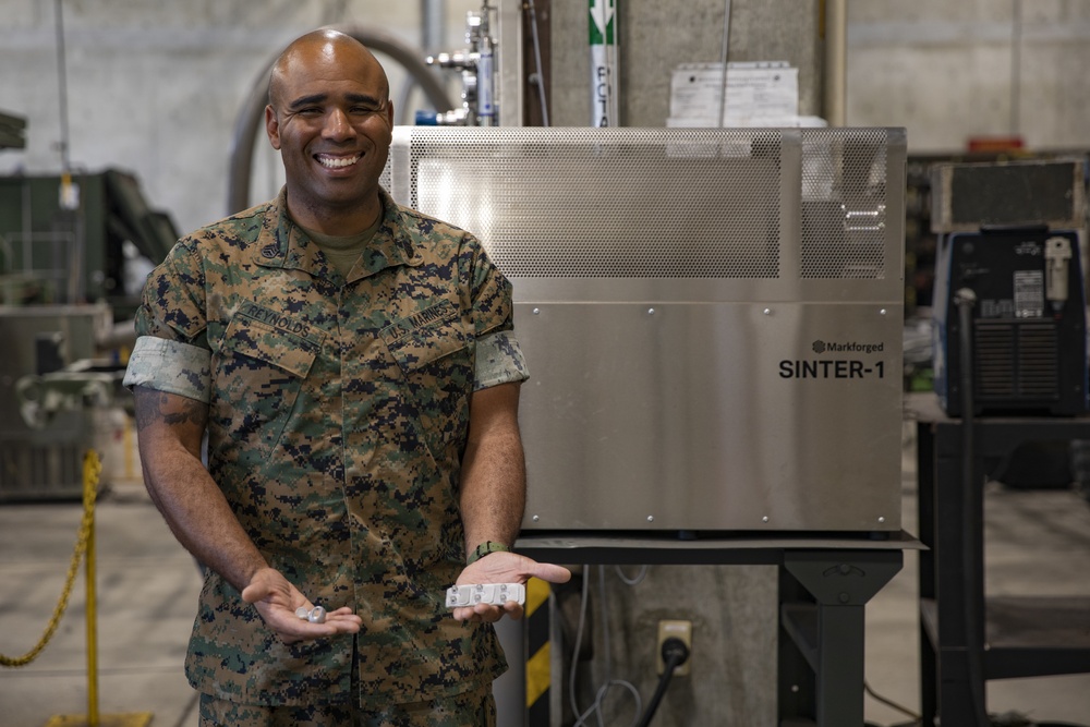 Into the 3rd Dimension | 3rd MLG Marines create metal parts using a 3D printer