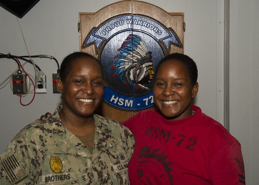 Deployed Aircraft Carriers Conduct Family Member Cross-Deck Visit