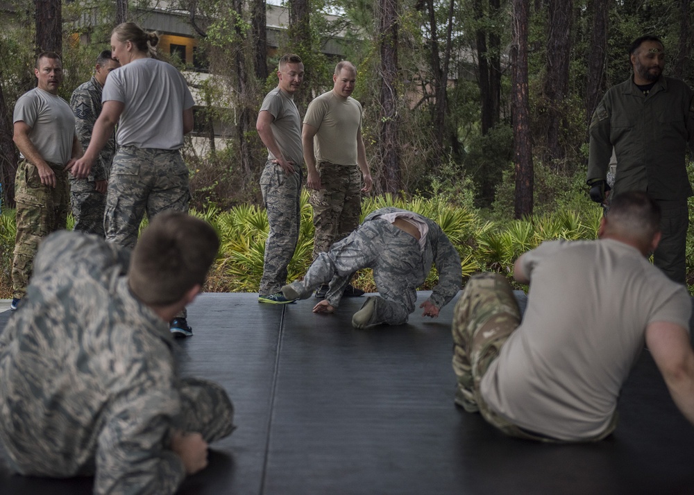 Air Commandos practice combatives as part of ACFC course