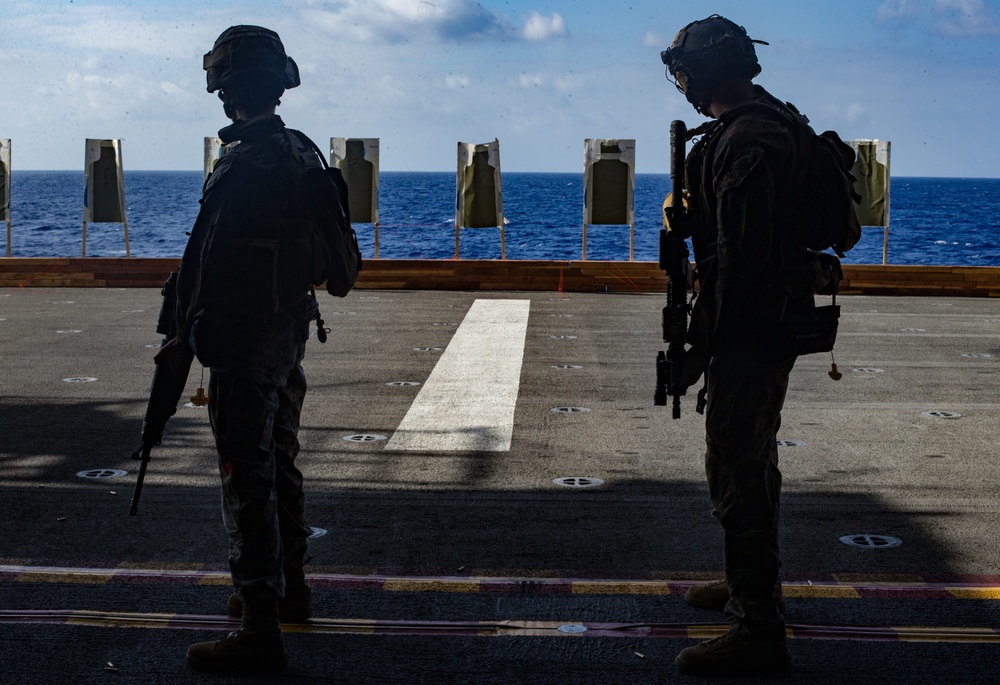 31st MEU Marines and Sailors aboard USS America conduct live fire range