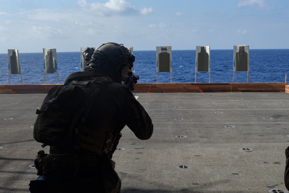 31st MEU Marines and Sailors aboard USS America conduct live fire range