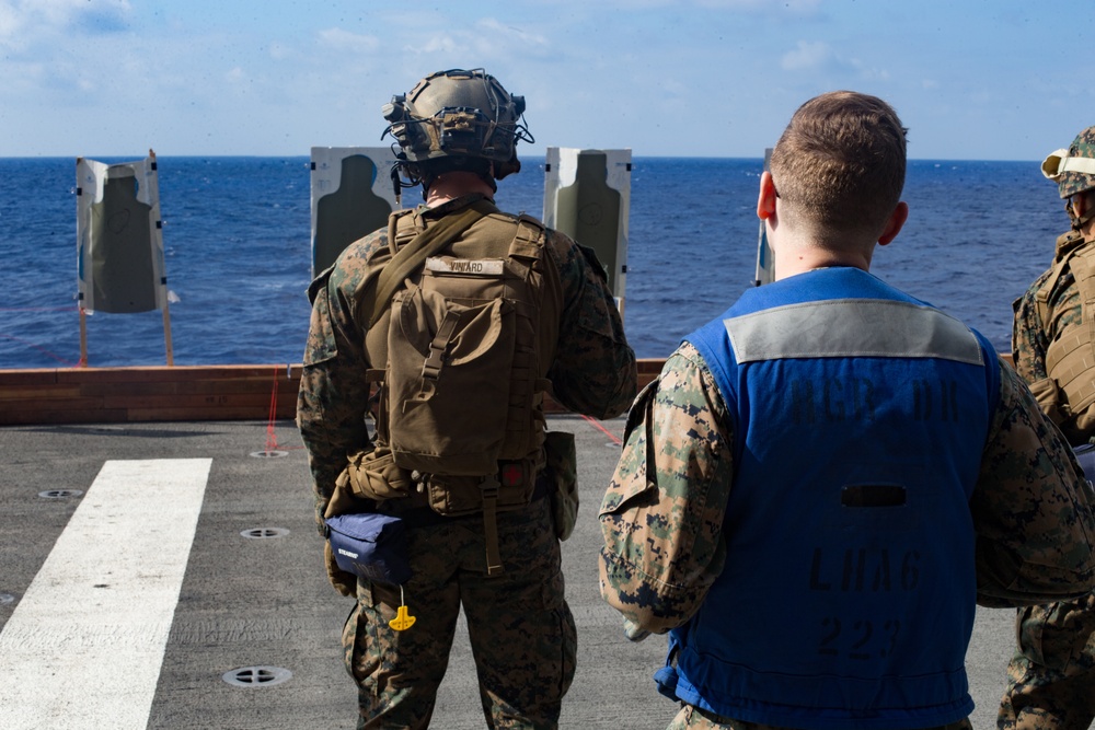 31st MEU Marines and Sailors aboard USS America conduct live fire range