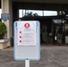 Signs posted outside BHC Makalapa indicate COVID-19 screening procedures