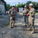 U.S. Navy Seabees with NMCB-5 host U.K. Royal Marines Deputy J4 and U.S. Army Chief for the Office of Defense Cooperation U.S. Embassy Dili, Timor-Leste.