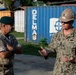 U.S. Navy Seabees with NMCB-5 host U.K. Royal Marines Deputy J4 and U.S. Army Chief for the Office of Defense Cooperation U.S. Embassy Dili, Timor-Leste.