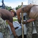 U.S. Navy Seabees from NMCB-5’s Detail Diego Garcia complete a military working dog shelter