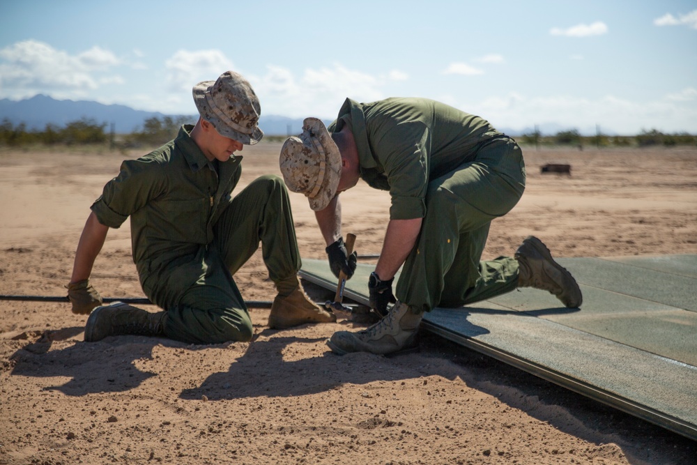 Marines with Weapons and Tactics Instructor course learn expeditionary airfield capabilities