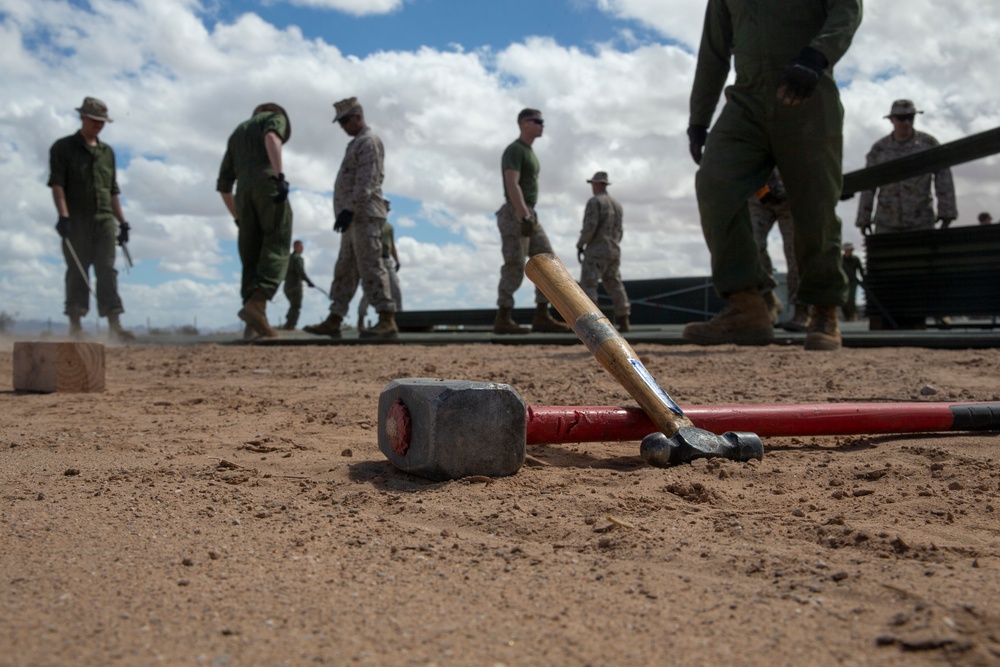 Marines with Weapons and Tactics Instructor course learn expeditionary airfield capabilities