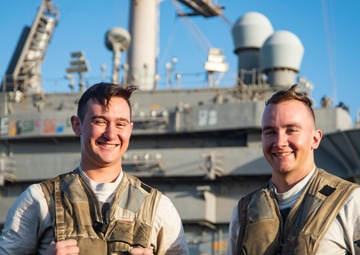 Childhood Friends Serve Together Aboard Deployed Aircraft Carrier
