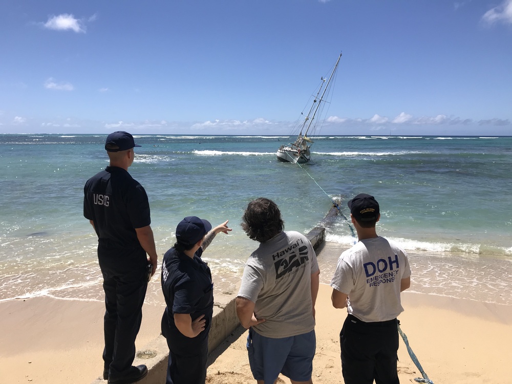 Coast Guard, partners working to remove aground vessel off Waikiki