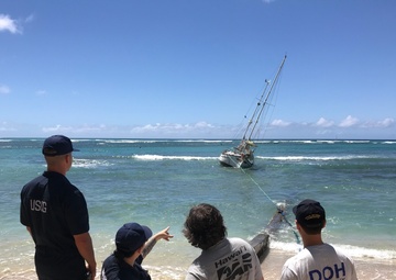 Imagery Available: Coast Guard, partners working to remove aground vessel off Waikiki