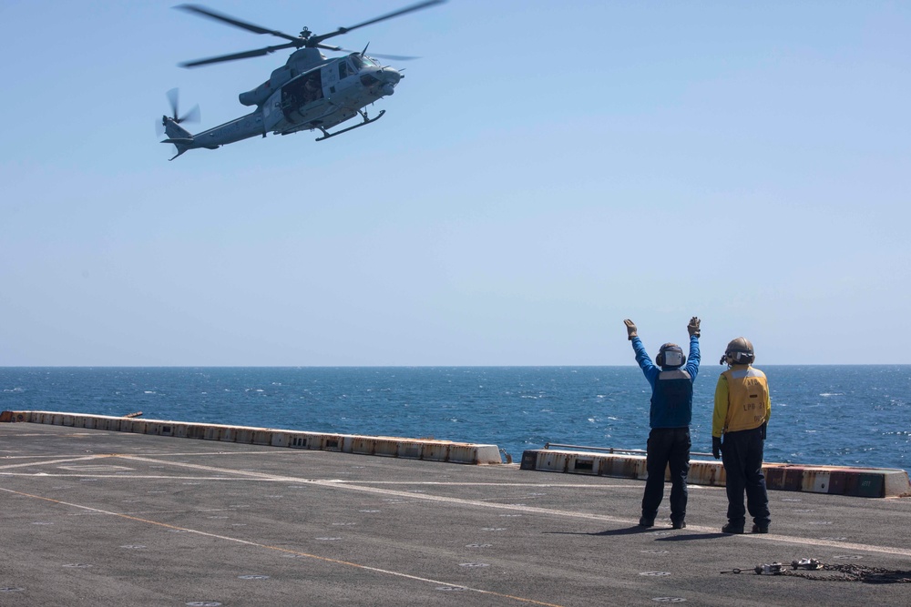 Sailors take part in flight operations