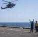 Sailors take part in flight operations