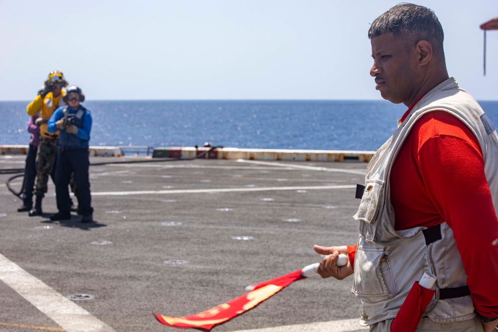 Sailors take part in flight deck fire fighting drills