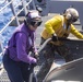 Sailors take part in flight deck fire fighting drills