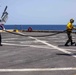 Sailors take part in flight deck fire fighting drills