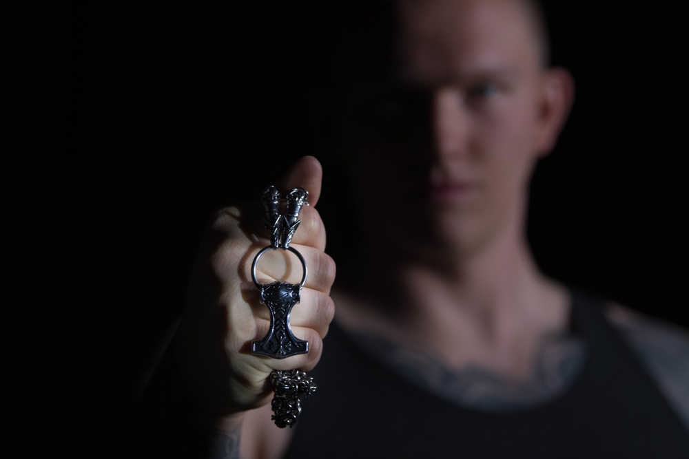 Hill Airman uses arm wrestling to persevere