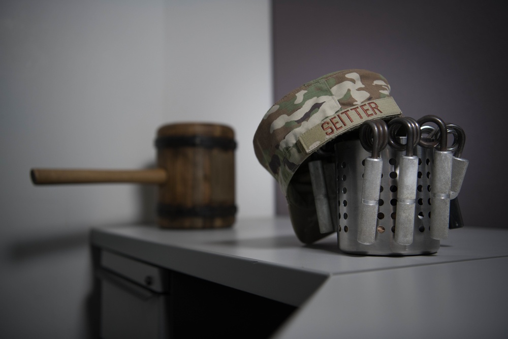 Hill Airman uses arm wrestling to persevere