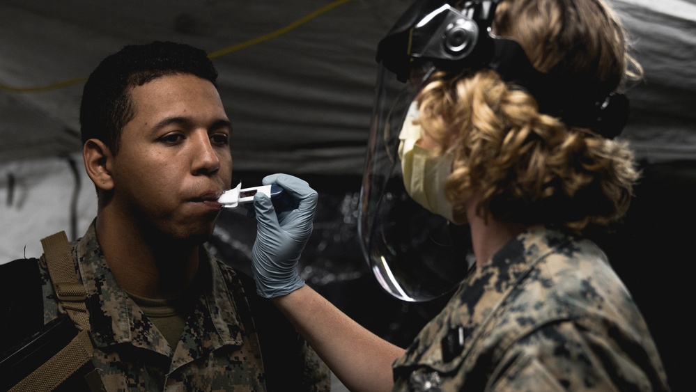 Marines Returning from Overseas Exercise Screened for COVID-19