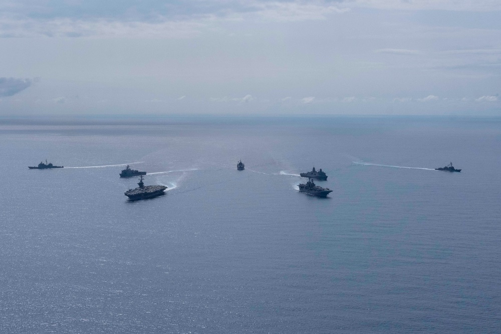 Theodore Roosevelt Carrier Strike Group, the America Expeditionary Strike Group, and the U.S. 7th Fleet Command Ship, USS Blue Ridge (LCC 19), Transit the Philippine Sea