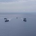 Theodore Roosevelt Carrier Strike Group, the America Expeditionary Strike Group, and the U.S. 7th Fleet Command Ship, USS Blue Ridge (LCC 19), Transit the Philippine Sea