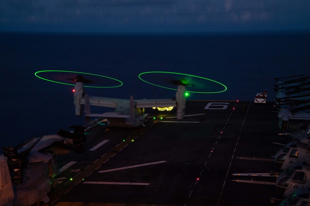 USS America (LHA 6) conducts flight operations