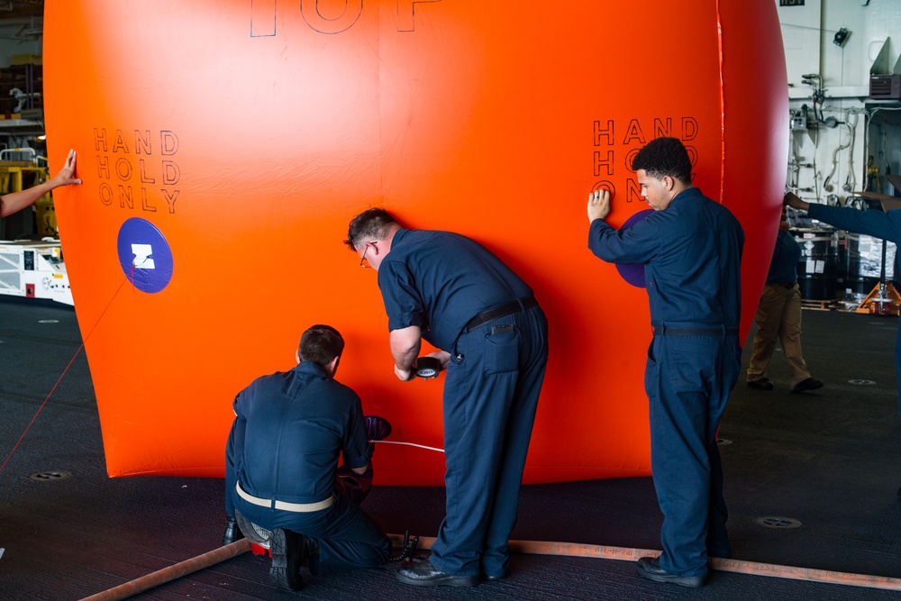 Killer Tomato: America Sailors inflate target for maritime exercise