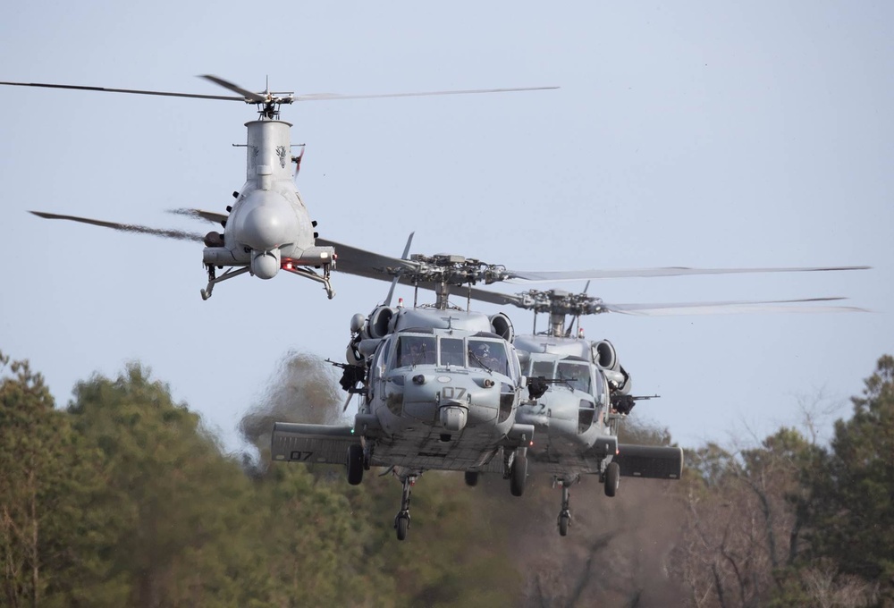 MH-60S and MQ-8B conduct hover checks