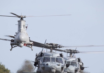 MH-60S and MQ-8B conduct hover checks