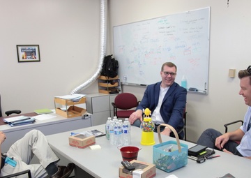 Cal Poly professor visits with NSWC PHD staffers