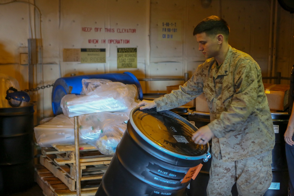 Marines work aboard USS Bataan