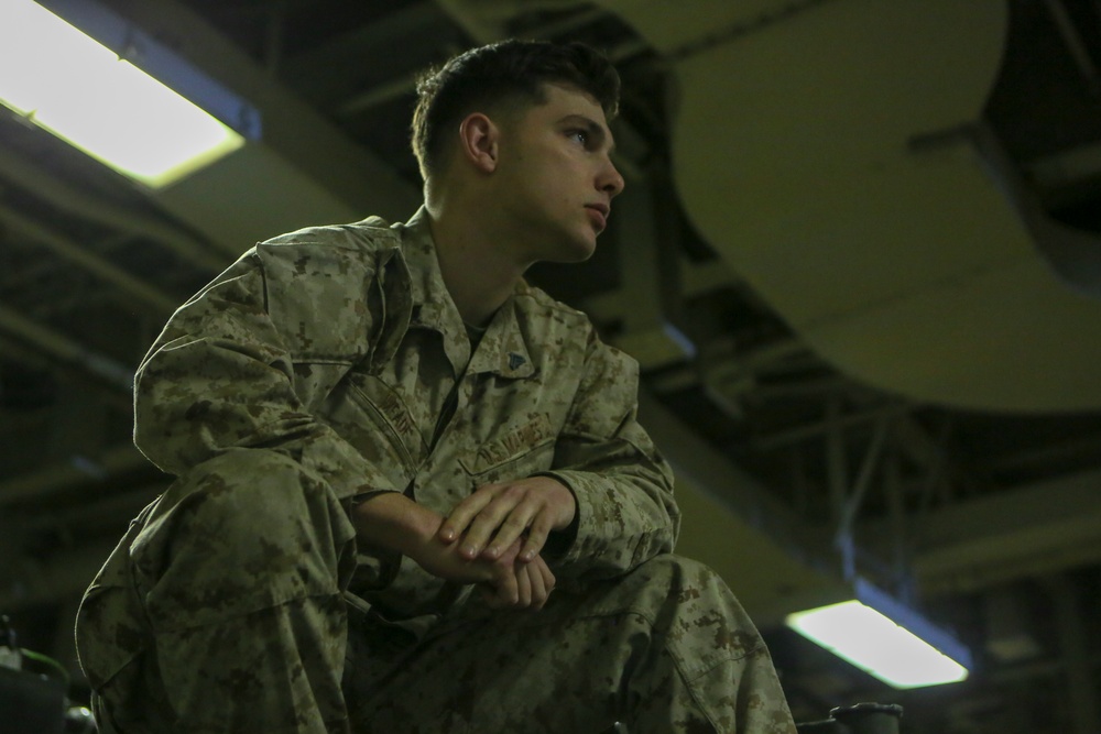 Marines work aboard USS Bataan