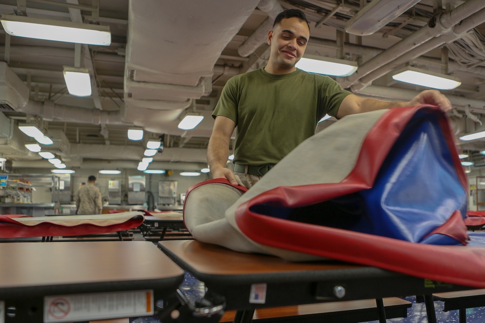 Marines work aboard USS Bataan