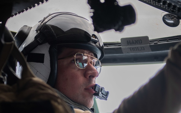 U.S. Sailor pre-flights an aircraft