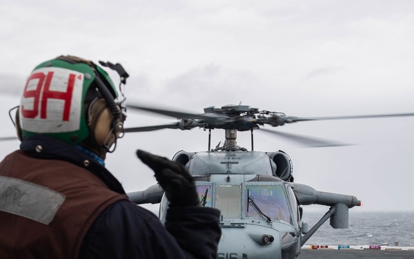 U.S. Sailor shuts down an MH-60S Sea Hawk