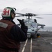 U.S. Sailor shuts down an MH-60S Sea Hawk