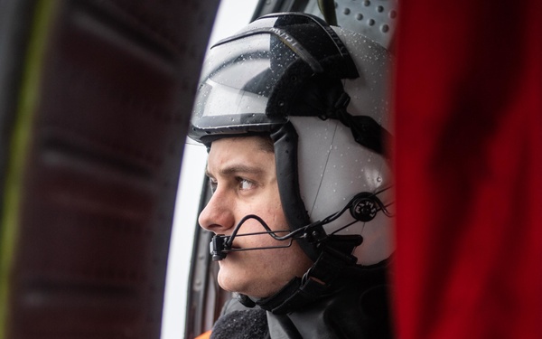 U.S. Sailor observes flight operations