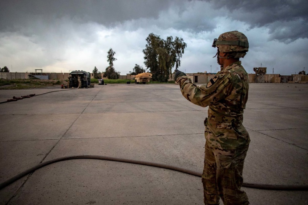 Soldiers conduct refueling operations at K1 Air Base