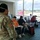 Florida Department of Health and Florida National Guard Soldiers work together at Orlando International Airport.