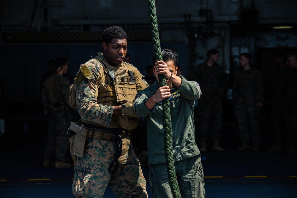 31st MEU MRF fast ropes aboard USS America