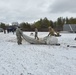 Cold-Weather Operations Course Class 20-05 students build Arctic 10-person tents