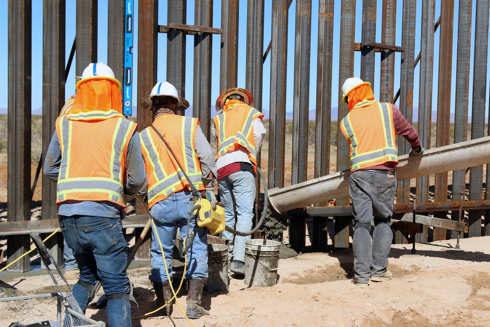 USACE South Pacific Border District contractor crew pours concrete into trench