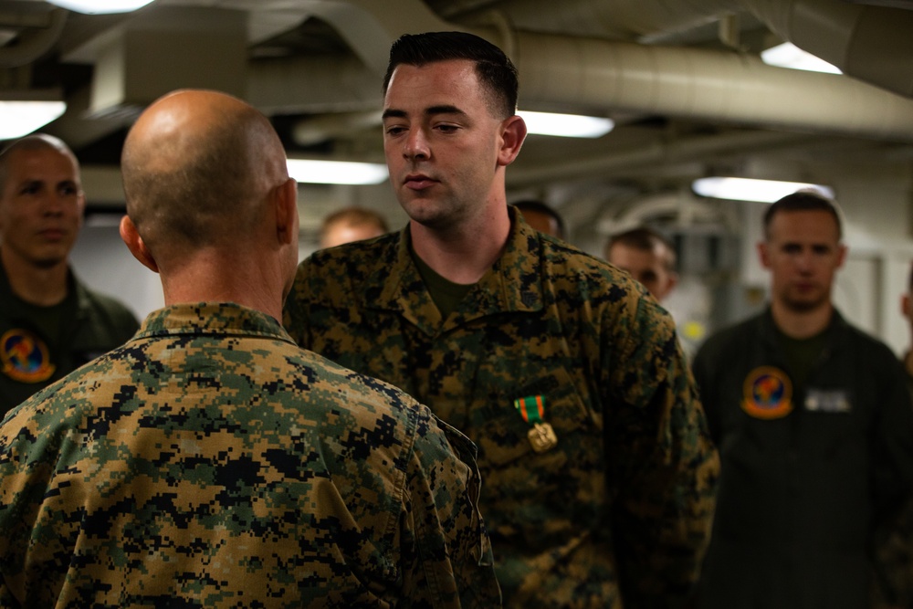 31st MEU Marines awarded by MEU commander aboard USS America