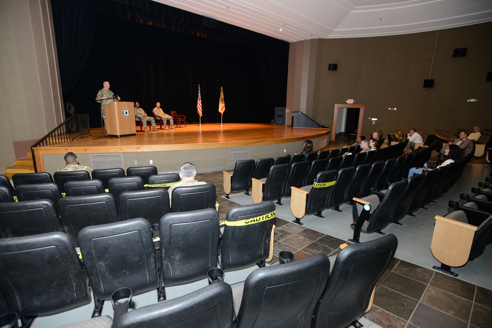 Attendees/viewers watch Fort Knox Garrison Change of Command Ceremony March 27