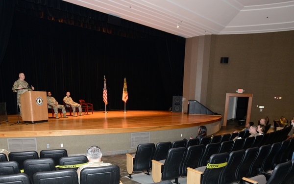 Attendees/viewers watch Fort Knox Garrison Change of Command Ceremony March 27