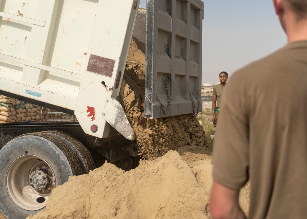 Al Udeid Airmen fill sandbags, enhance base defense
