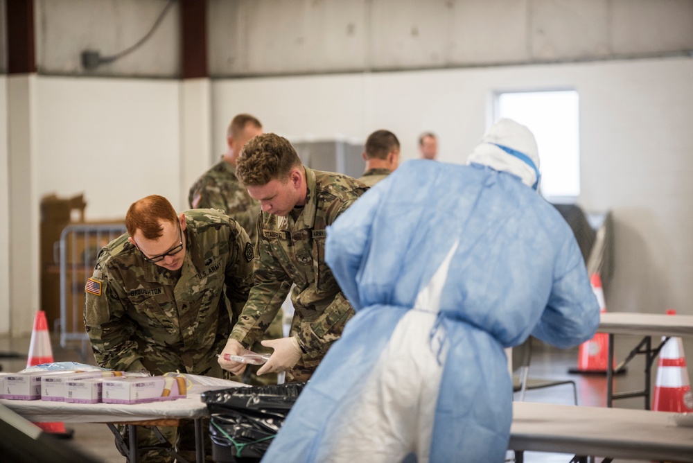 Illinois National Guardsmen operate COVID-19 testing site in Bloomington, Ill.